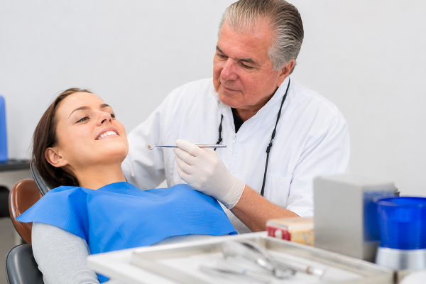 Dr Arthur Silva with patient